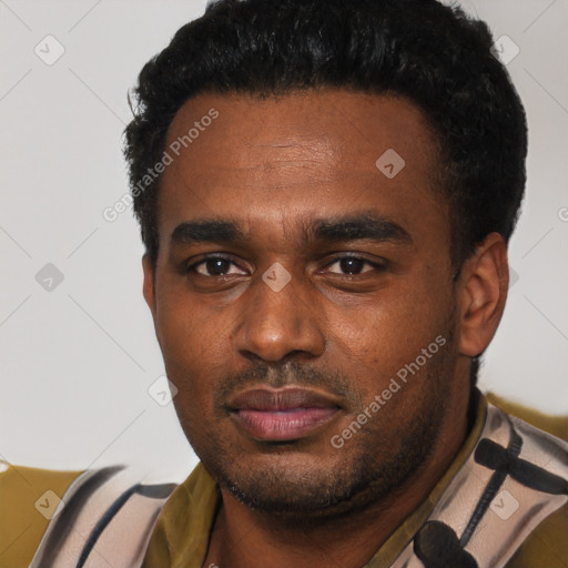 Neutral latino young-adult male with short  black hair and brown eyes