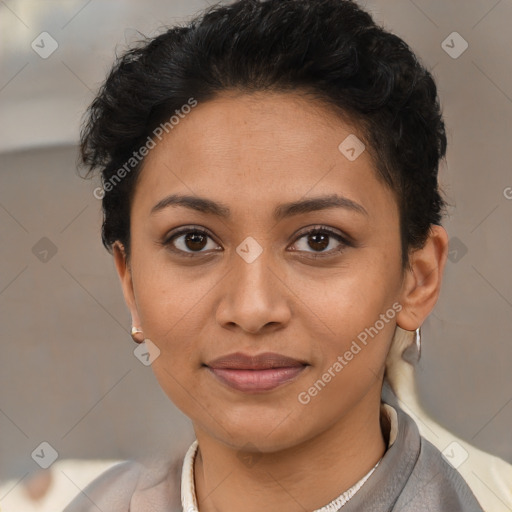 Joyful latino young-adult female with short  brown hair and brown eyes