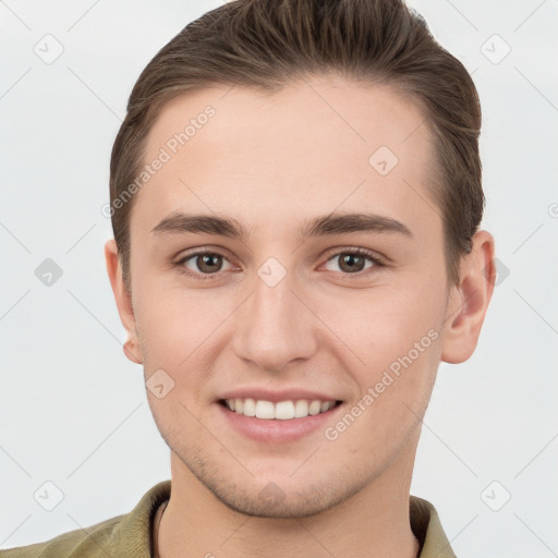 Joyful white young-adult female with short  brown hair and grey eyes