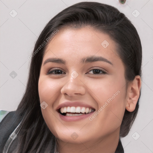 Joyful white young-adult female with long  black hair and brown eyes