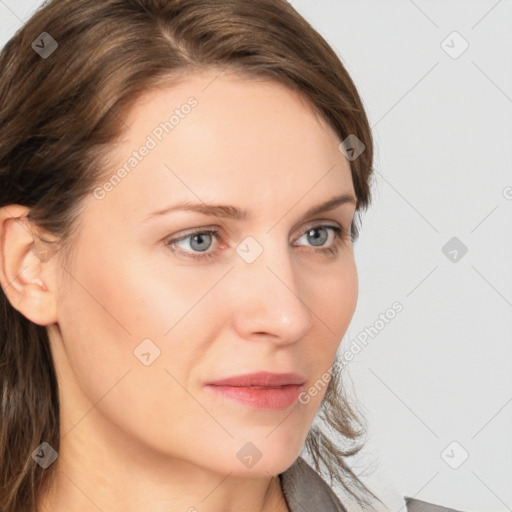 Neutral white young-adult female with medium  brown hair and grey eyes