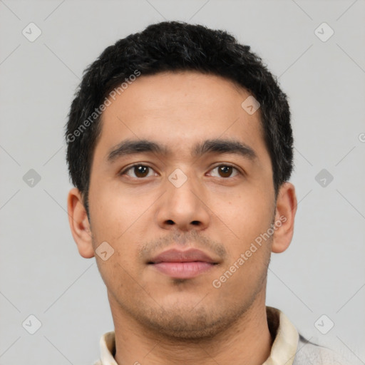 Neutral latino young-adult male with short  black hair and brown eyes