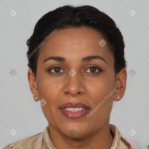 Joyful latino young-adult female with short  brown hair and brown eyes