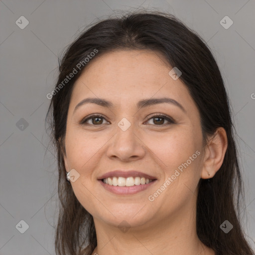 Joyful white young-adult female with long  brown hair and brown eyes