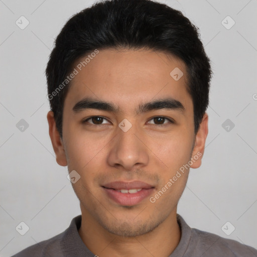 Joyful latino young-adult male with short  black hair and brown eyes