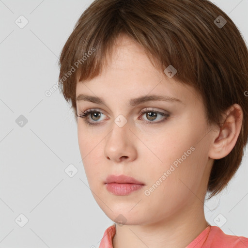 Neutral white young-adult female with short  brown hair and brown eyes