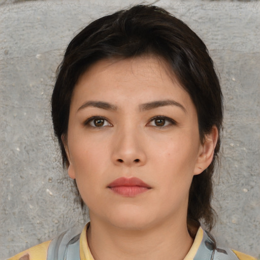 Neutral asian young-adult female with short  brown hair and brown eyes