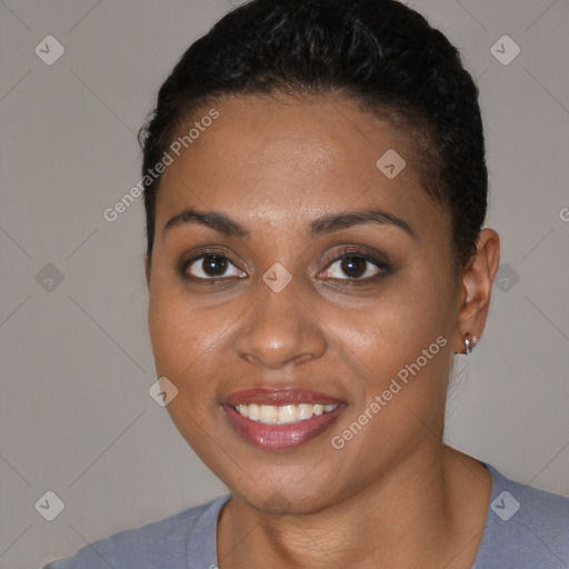 Joyful black young-adult female with short  brown hair and brown eyes