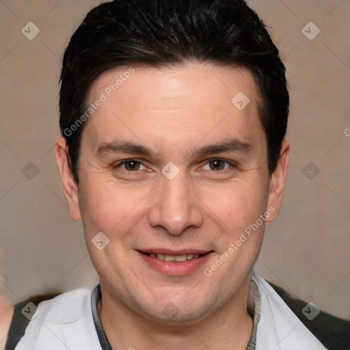 Joyful white adult male with short  brown hair and brown eyes