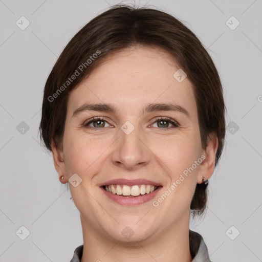 Joyful white young-adult female with medium  brown hair and grey eyes