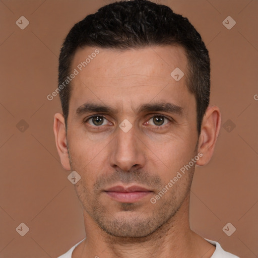 Joyful white young-adult male with short  black hair and brown eyes