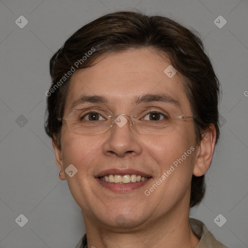 Joyful white adult female with short  brown hair and brown eyes