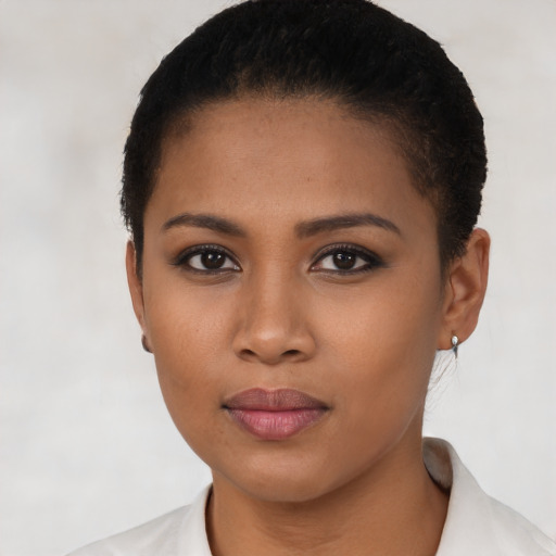 Neutral latino young-adult female with short  brown hair and brown eyes
