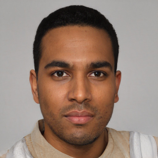 Neutral black young-adult male with short  black hair and brown eyes