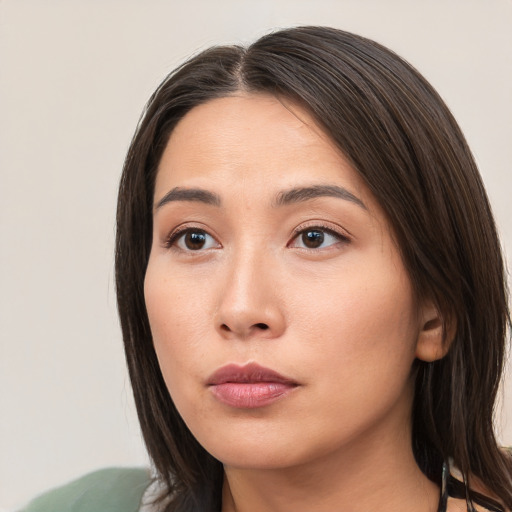 Neutral white young-adult female with medium  brown hair and brown eyes