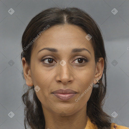 Joyful latino young-adult female with medium  brown hair and brown eyes