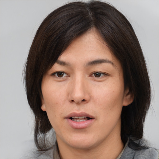 Neutral white young-adult female with medium  brown hair and brown eyes