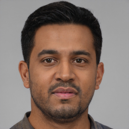Neutral latino young-adult male with short  black hair and brown eyes