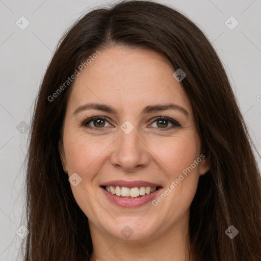 Joyful white young-adult female with long  brown hair and grey eyes