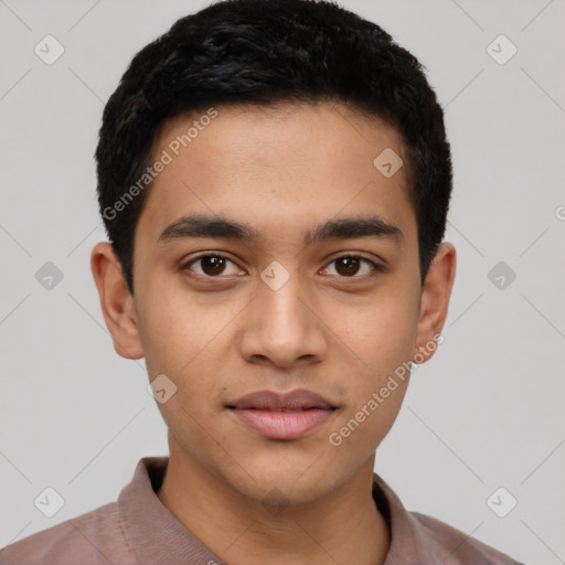 Joyful latino young-adult male with short  black hair and brown eyes