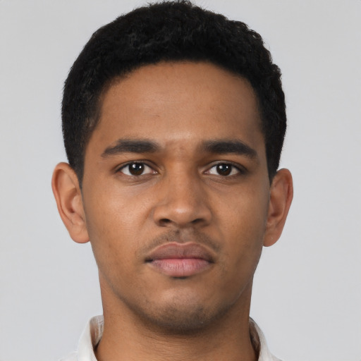Neutral black young-adult male with short  black hair and brown eyes