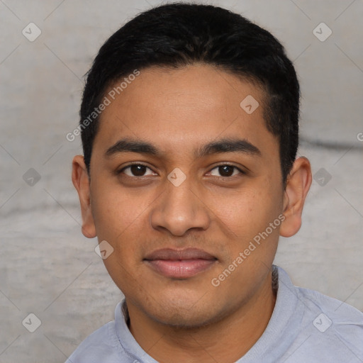 Joyful latino young-adult male with short  black hair and brown eyes