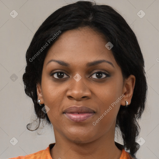 Joyful black young-adult female with medium  black hair and brown eyes