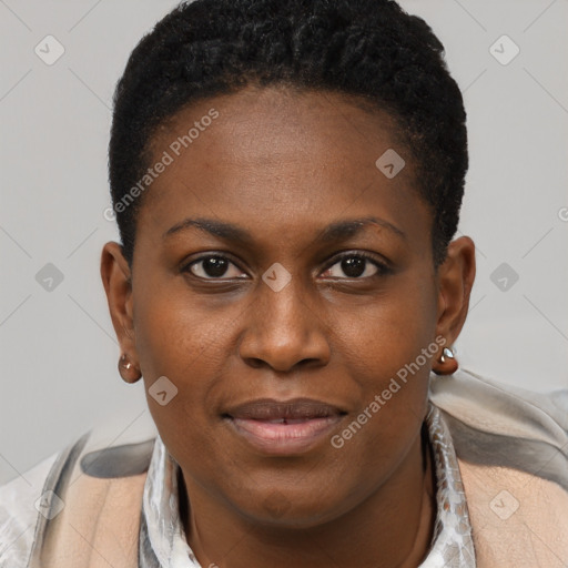 Joyful black young-adult female with short  brown hair and brown eyes