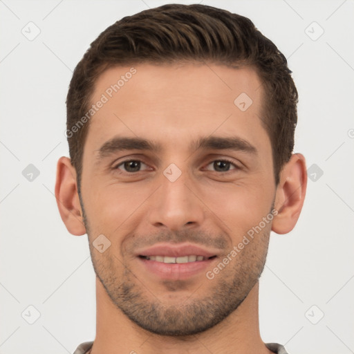 Joyful white young-adult male with short  brown hair and brown eyes