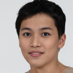 Joyful asian young-adult female with short  black hair and brown eyes