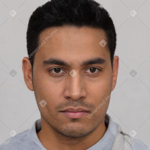 Neutral latino young-adult male with short  black hair and brown eyes