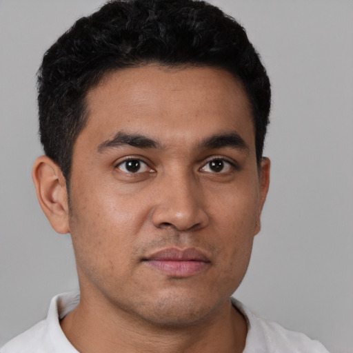 Neutral white young-adult male with short  black hair and brown eyes
