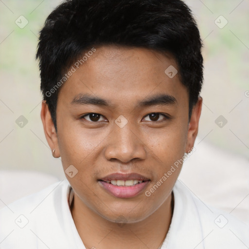 Joyful asian young-adult male with short  brown hair and brown eyes