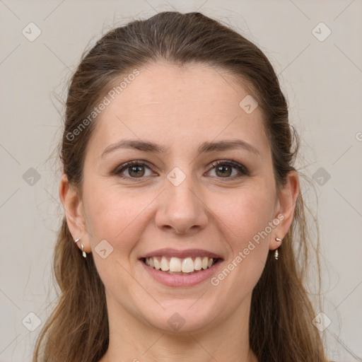 Joyful white young-adult female with long  brown hair and grey eyes