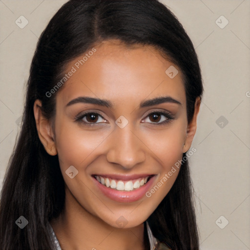 Joyful latino young-adult female with long  brown hair and brown eyes