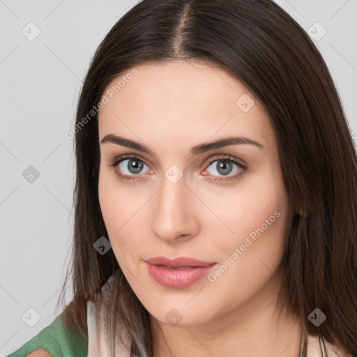 Neutral white young-adult female with long  brown hair and brown eyes