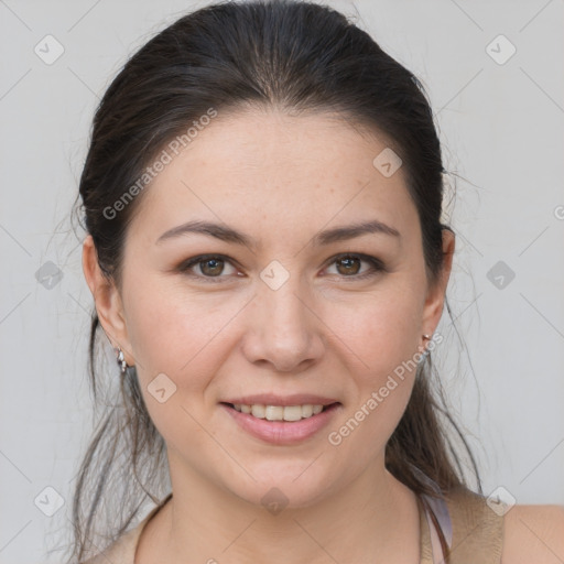 Joyful white young-adult female with medium  brown hair and brown eyes