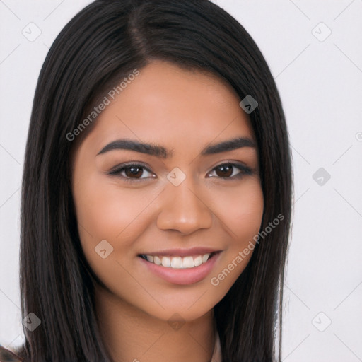 Joyful latino young-adult female with long  brown hair and brown eyes