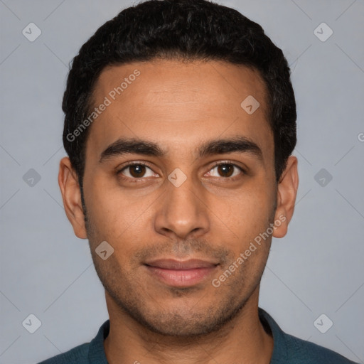 Joyful latino young-adult male with short  black hair and brown eyes