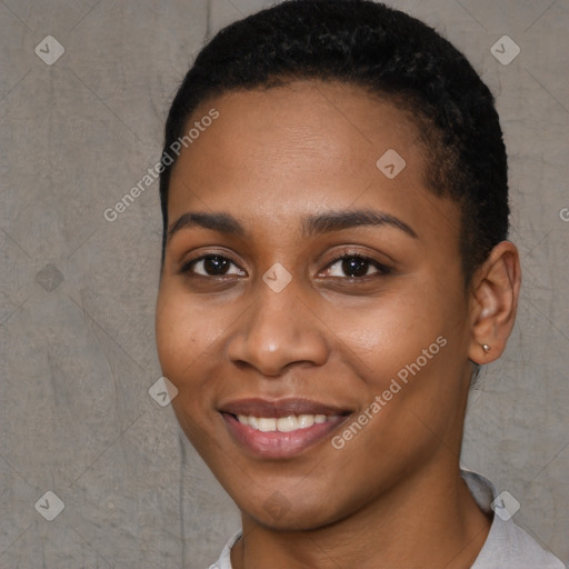 Joyful black young-adult female with short  brown hair and brown eyes