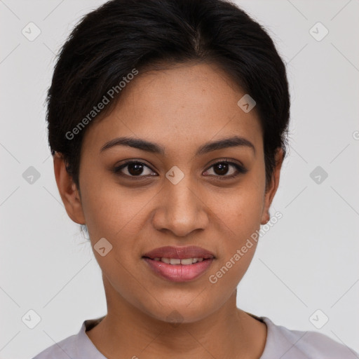 Joyful latino young-adult female with short  brown hair and brown eyes