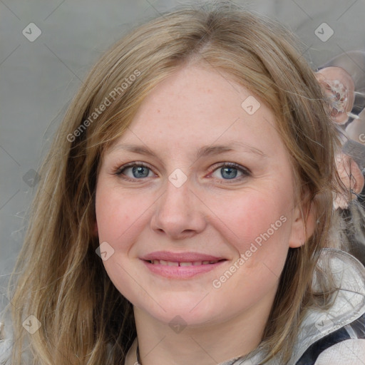 Joyful white adult female with medium  brown hair and blue eyes