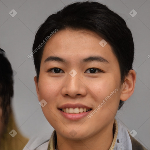 Joyful asian young-adult female with medium  black hair and brown eyes