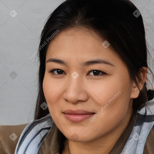 Joyful asian young-adult female with medium  brown hair and brown eyes