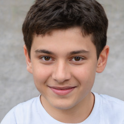 Joyful white child male with short  brown hair and brown eyes