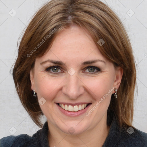 Joyful white adult female with medium  brown hair and grey eyes