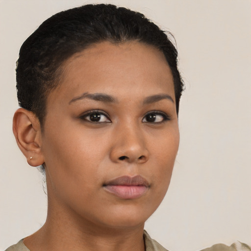 Neutral black young-adult female with short  brown hair and brown eyes