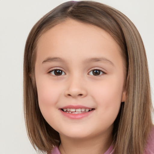 Joyful white child female with medium  brown hair and brown eyes