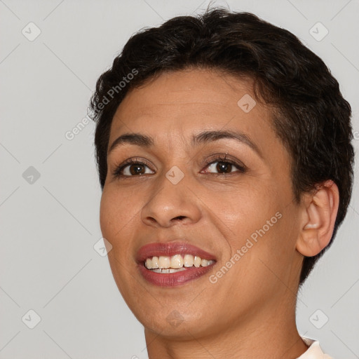 Joyful white adult female with short  brown hair and brown eyes