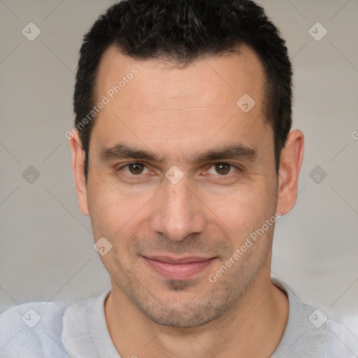 Joyful white adult male with short  brown hair and brown eyes